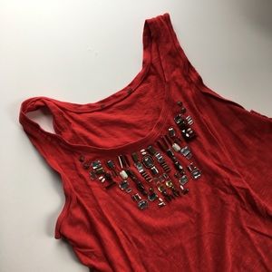 red top with jewel detailing
